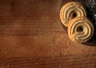 Image showing Cookies on wooden table background