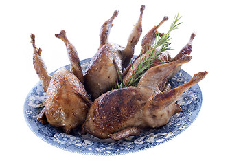 Image showing four quails baked