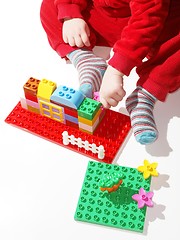 Image showing Toddler playing building toys