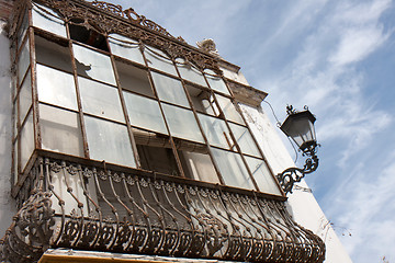 Image showing Damaged wrought iron veranda.