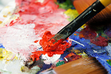 Image showing Art palette and paintbrushes 