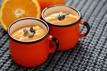 Image showing pumpkin soup with orange