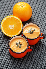 Image showing pumpkin soup with orange