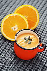 Image showing pumpkin soup with orange