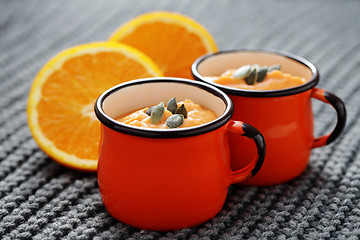 Image showing pumpkin soup with orange