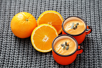 Image showing pumpkin soup with orange