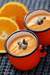Image showing pumpkin soup with orange