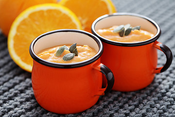 Image showing pumpkin soup with orange