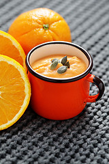 Image showing pumpkin soup with orange