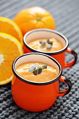 Image showing pumpkin soup with orange