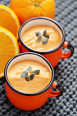 Image showing pumpkin soup with orange