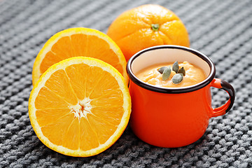 Image showing pumpkin soup with orange