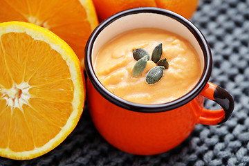 Image showing pumpkin soup with orange