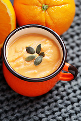 Image showing pumpkin soup with orange
