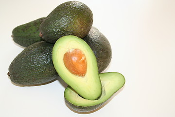 Image showing Green avocados on white background