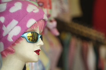 Image showing Worn mannequin with pink cap