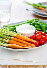 Image showing Fresh vegetables with dipping sauce