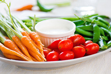 Image showing Fresh vegetables with dipping sauce