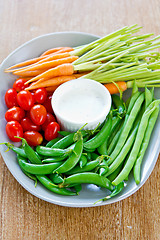 Image showing Fresh vegetables with dipping sauce