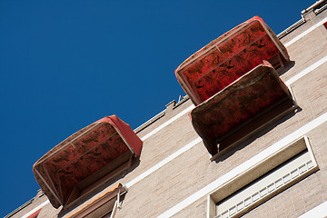 Image showing Three big awnings on a facade
