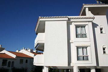 Image showing white washed apartment block