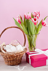 Image showing pink present and colorful tulips festive easter decoration