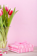 Image showing pink and white tulips present ribbon easter birthday