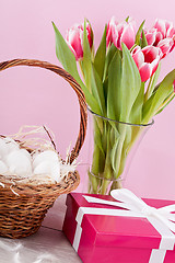 Image showing pink present and colorful tulips festive easter decoration