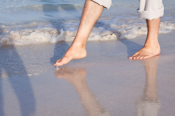 Image showing barefoot in the sand in summer holidays