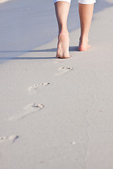 Image showing barefoot in the sand in summer holidays