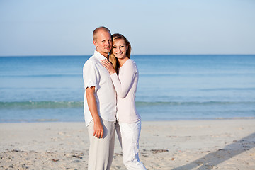 Image showing happy couple in love having fun on the beach