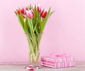 Image showing pink and white tulips present ribbon easter birthday