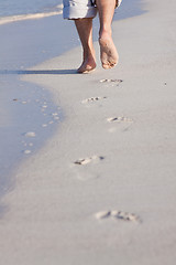 Image showing barefoot in the sand in summer holidays