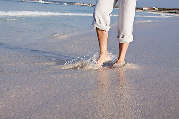 Image showing barefoot in the sand in summer holidays