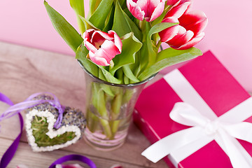 Image showing pink and white tulips present ribbon easter birthday