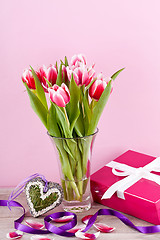 Image showing pink and white tulips present ribbon easter birthday