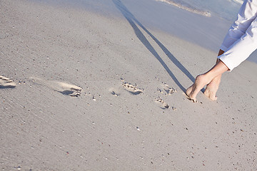 Image showing barefoot in the sand in summer holidays