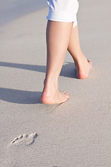 Image showing barefoot in the sand in summer holidays