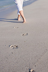 Image showing barefoot in the sand in summer holidays