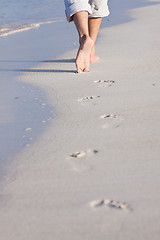 Image showing barefoot in the sand in summer holidays