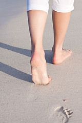 Image showing barefoot in the sand in summer holidays