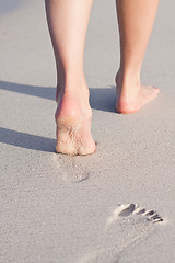 Image showing barefoot in the sand in summer holidays