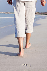 Image showing barefoot in the sand in summer holidays