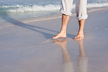 Image showing barefoot in the sand in summer holidays