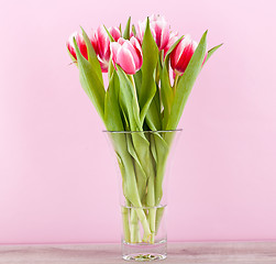 Image showing pink and white tulips present ribbon easter birthday