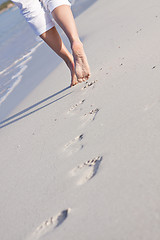 Image showing barefoot in the sand in summer holidays