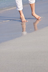 Image showing barefoot in the sand in summer holidays