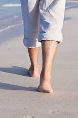 Image showing barefoot in the sand in summer holidays