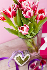 Image showing pink and white tulips present ribbon easter birthday