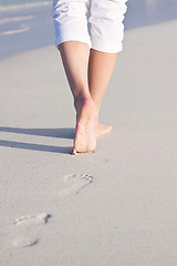 Image showing barefoot in the sand in summer holidays